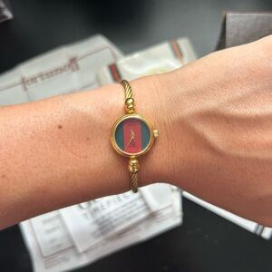 Gucci 6 1/2” mother of pearl lovely authentic ladies gold bangle watch